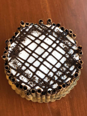 Our Chocolate Mocha ice cream cake is completely surrounded by chopped mocha sticks that are drizzled with chocolate fudge. We layer the fudge along the top of the cake in a crisscrossing pattern and add chocolate cake crunch as a final touch.
